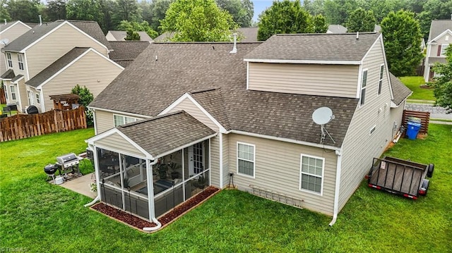 183 Kentland Ridge Dr, Kernersville, NC 27284 - rear view of property featuring a sunroom, roof with shingles, and a patio area