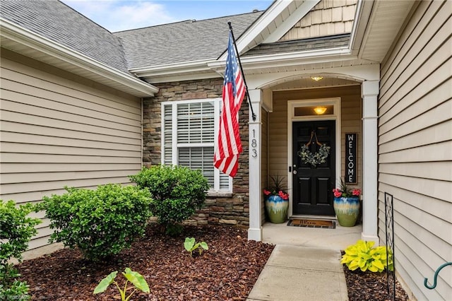 183 Kentland Ridge Dr, Kernersville, NC 27284 - entrance to property featuring stone siding and a shingled roof