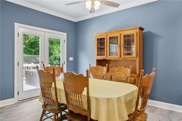 5360 Graycliff Ln, Clemmons, NC 27012 - dining area featuring light wood-style flooring, ceiling fan, and ornamental molding