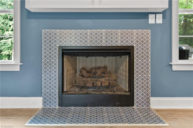 5360 Graycliff Ln, Clemmons, NC 27012 - detailed view of a tile fireplace and wood finished floors