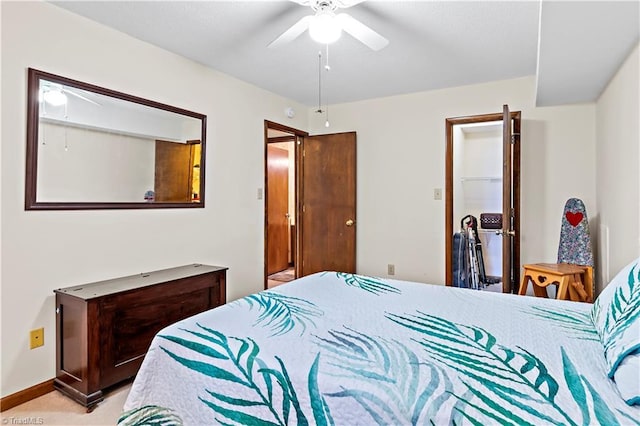 bedroom with baseboards, light colored carpet, and ceiling fan