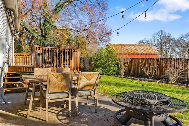 view of patio with a fenced backyard and outdoor dining space