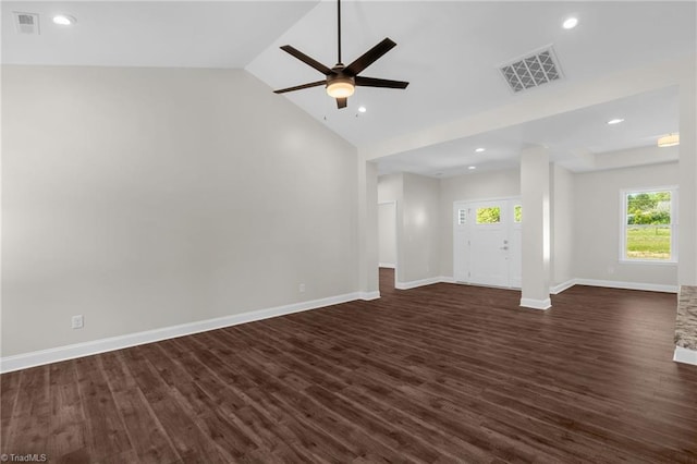 unfurnished living room with recessed lighting, lofted ceiling, dark wood-style floors, visible vents, and baseboards