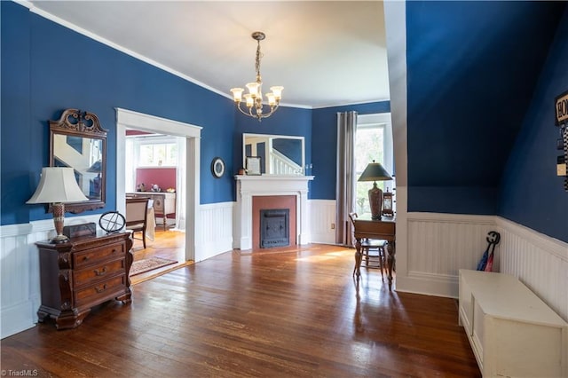 entryway featuring hardwood / wood-style flooring, a healthy amount of sunlight, and a notable chandelier