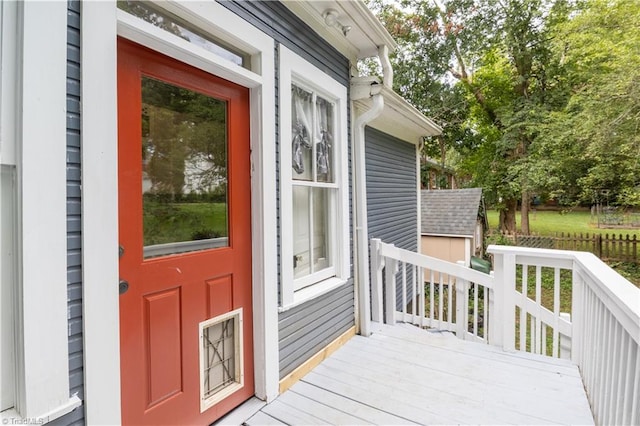 property entrance with a deck