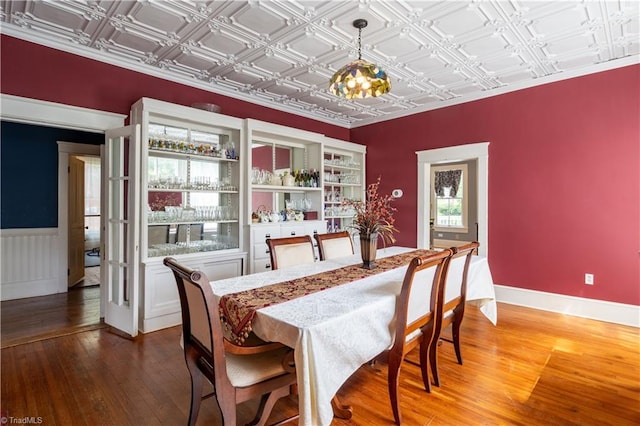 dining room with hardwood / wood-style floors