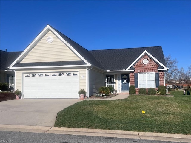 view of front of home with a garage, brick siding, a front lawn, concrete driveway, and a shingled roof