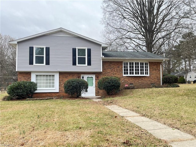 split level home featuring a front yard