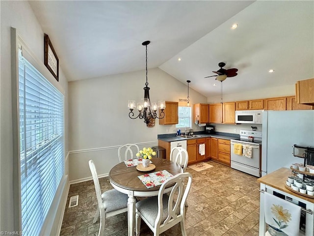 266 Sailway Rd, Winston-Salem, NC 27127 - kitchen featuring white appliances, ceiling fan, a chandelier, pendant lighting, and dark countertops