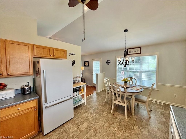 266 Sailway Rd, Winston-Salem, NC 27127 - kitchen with freestanding refrigerator, dark countertops, a ceiling fan, baseboards, and a chandelier