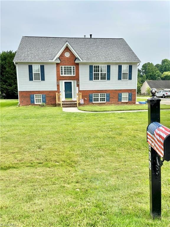266 Sailway Rd, Winston-Salem, NC 27127 - bi-level home with a front yard and a shingled roof