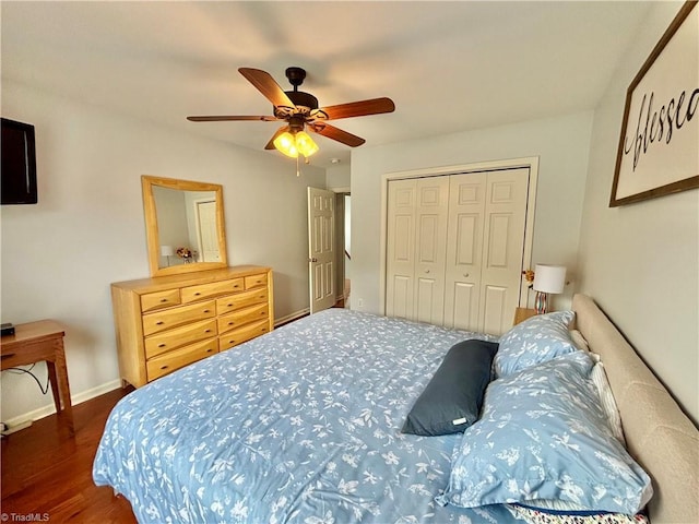 266 Sailway Rd, Winston-Salem, NC 27127 - bedroom featuring dark wood-style flooring, a closet, a ceiling fan, and baseboards