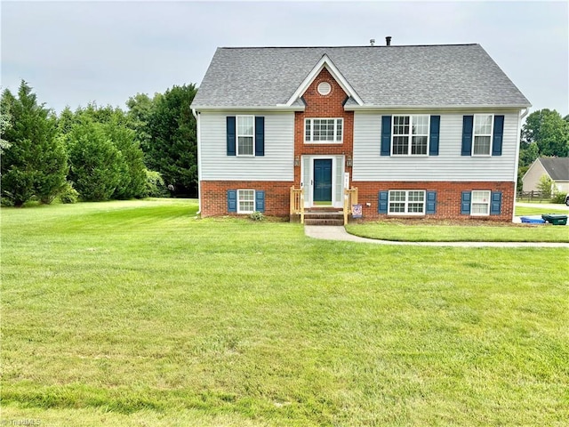 266 Sailway Rd, Winston-Salem, NC 27127 - bi-level home featuring a front yard, a shingled roof, and brick siding