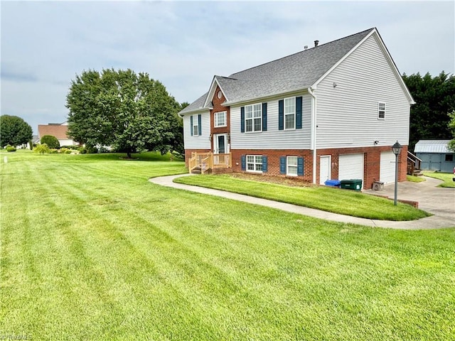 266 Sailway Rd, Winston-Salem, NC 27127 - view of front of property with an attached garage, concrete driveway, a front lawn, a shingled roof, and brick siding