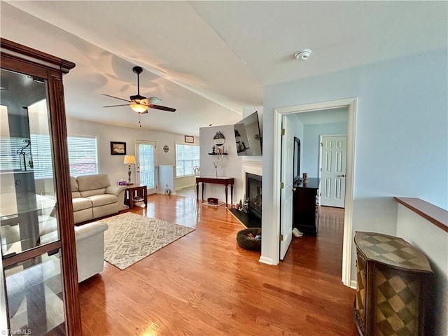 266 Sailway Rd, Winston-Salem, NC 27127 - living room with ceiling fan, wood finished floors, a glass covered fireplace, and baseboards