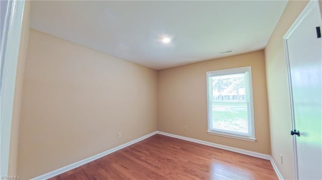 2209 Bracyridge Rd, Greensboro, NC 27407 - spare room with wood finished floors and baseboards