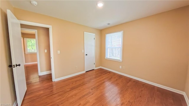2209 Bracyridge Rd, Greensboro, NC 27407 - unfurnished bedroom featuring baseboards and light wood finished floors