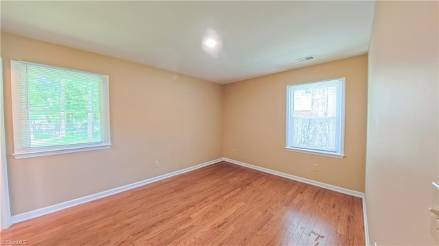 2209 Bracyridge Rd, Greensboro, NC 27407 - spare room with baseboards and light wood finished floors