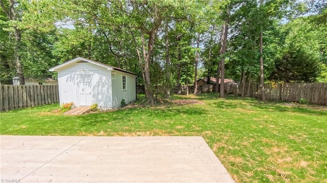 2209 Bracyridge Rd, Greensboro, NC 27407 - view of yard with a patio and view of wooded area