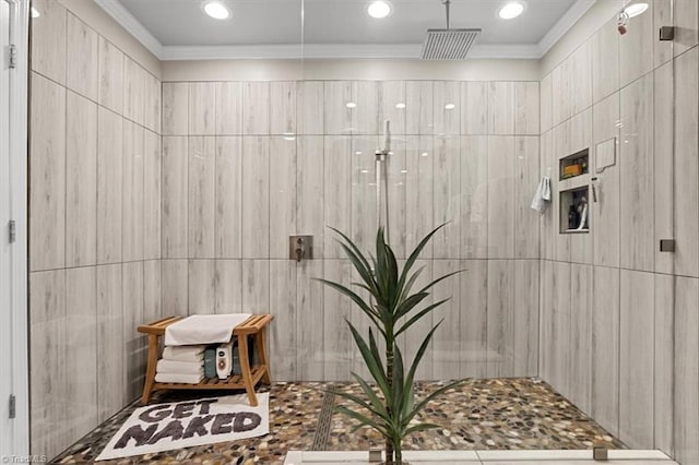 bathroom with tile walls and ornamental molding