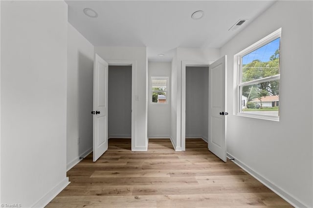 301 Rockspring Rd, High Point, NC 27262 - unfurnished bedroom featuring light wood-style flooring and baseboards