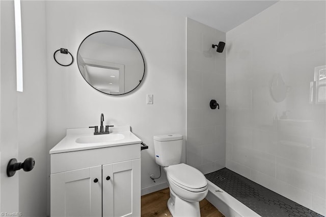 301 Rockspring Rd, High Point, NC 27262 - full bathroom featuring vanity, wood finished floors, and a tile shower