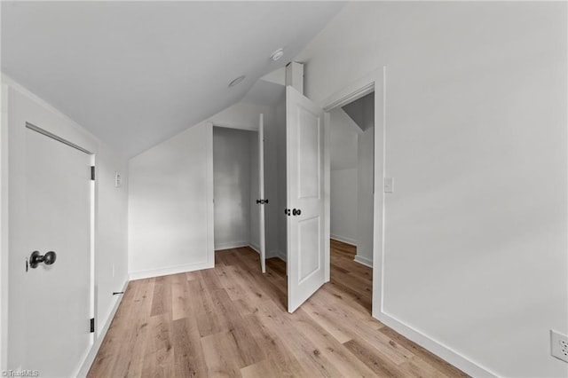 301 Rockspring Rd, High Point, NC 27262 - additional living space featuring light wood-style flooring and vaulted ceiling