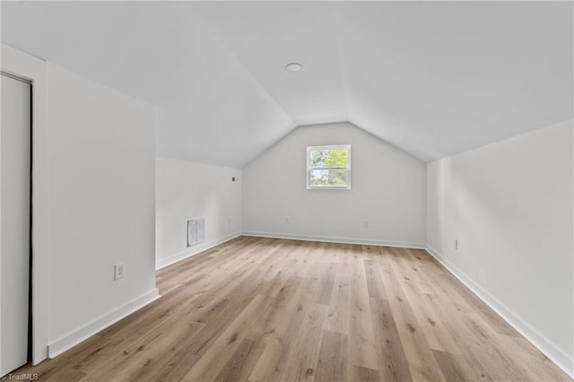 301 Rockspring Rd, High Point, NC 27262 - additional living space featuring lofted ceiling and light wood-style flooring