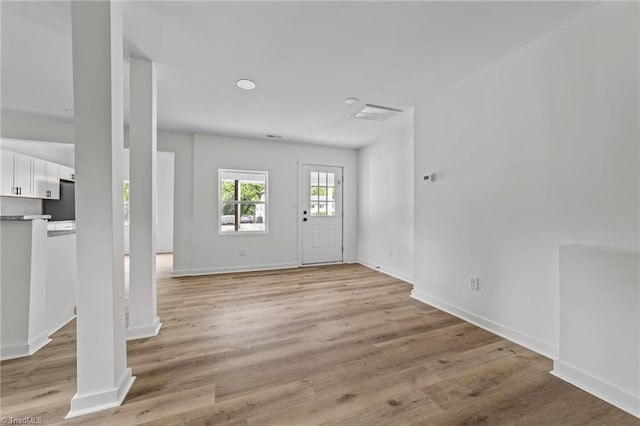 301 Rockspring Rd, High Point, NC 27262 - entrance foyer with light wood finished floors and baseboards
