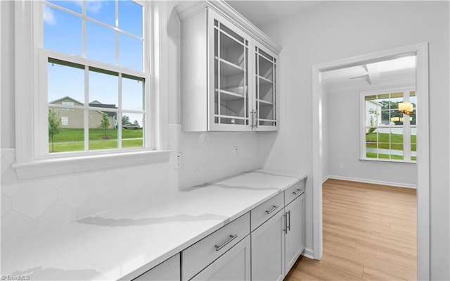 700 Fairmile Dr, Greensboro, NC 27455 - bar with decorative backsplash and light wood finished floors