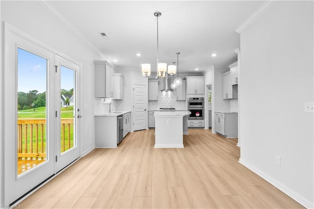 700 Fairmile Dr, Greensboro, NC 27455 - kitchen featuring stainless steel appliances, gray cabinetry, tasteful backsplash, crown molding, and light countertops