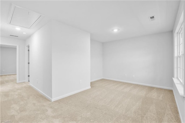 700 Fairmile Dr, Greensboro, NC 27455 - carpeted empty room featuring attic access, baseboards, and recessed lighting