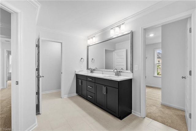 700 Fairmile Dr, Greensboro, NC 27455 - bathroom featuring double vanity, ornamental molding, and baseboards
