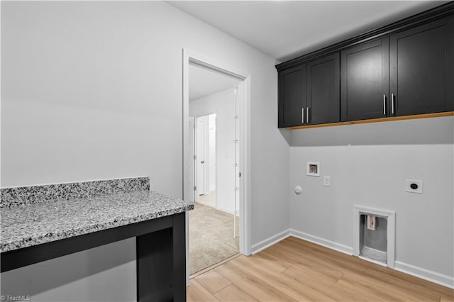 700 Fairmile Dr, Greensboro, NC 27455 - washroom featuring cabinet space, hookup for an electric dryer, light wood finished floors, hookup for a washing machine, and gas dryer hookup
