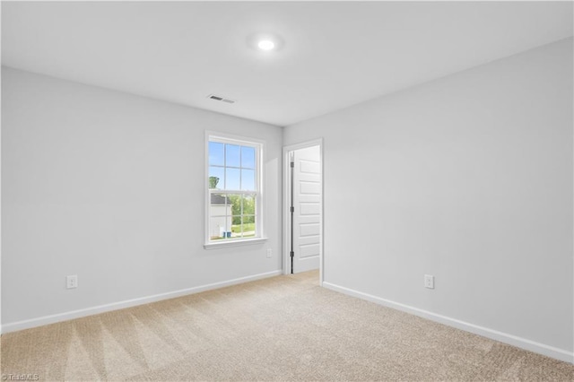700 Fairmile Dr, Greensboro, NC 27455 - spare room featuring baseboards and carpet flooring