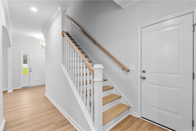 700 Fairmile Dr, Greensboro, NC 27455 - staircase with ornamental molding, wood finished floors, a chandelier, recessed lighting, and baseboards