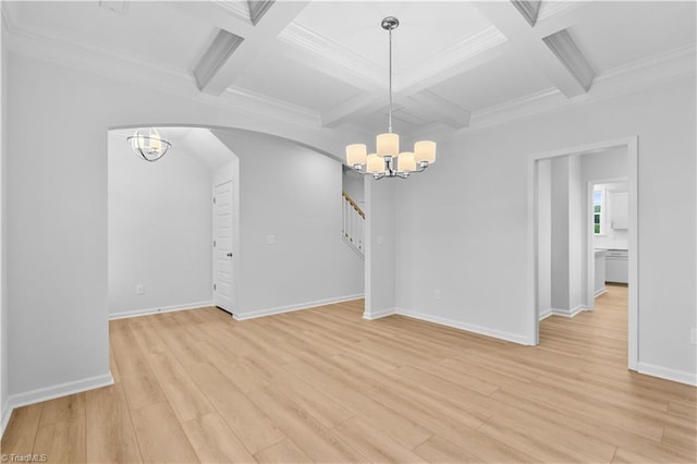 700 Fairmile Dr, Greensboro, NC 27455 - spare room with a chandelier, coffered ceiling, beamed ceiling, light wood-type flooring, and arched walkways