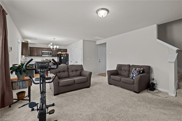 living room featuring light carpet, stairway, a chandelier, and baseboards