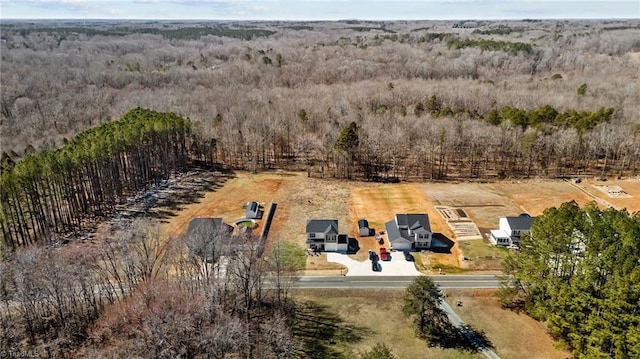 aerial view featuring a forest view