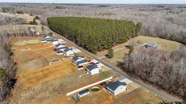 bird's eye view featuring a view of trees