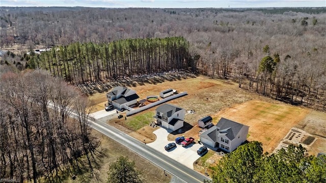 aerial view featuring a view of trees