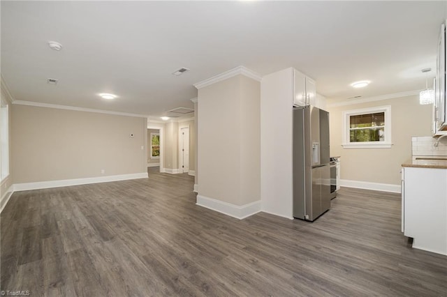 interior space featuring sink, dark wood-type flooring, and ornamental molding