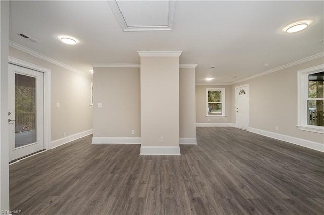 unfurnished living room featuring ornamental molding and dark wood-type flooring