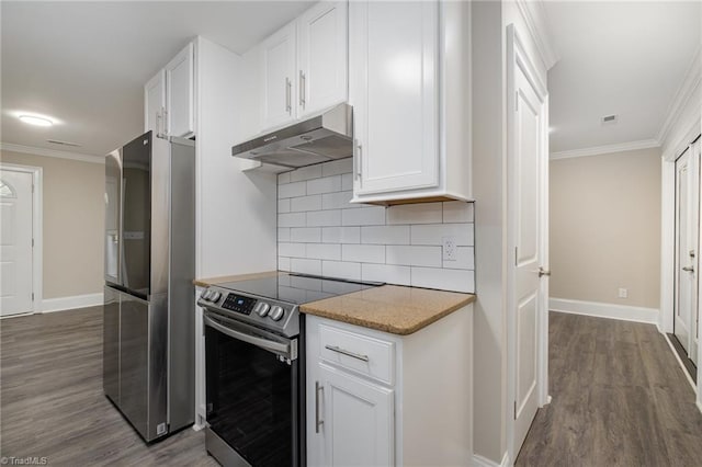 kitchen with decorative backsplash, white cabinets, dark hardwood / wood-style floors, and appliances with stainless steel finishes