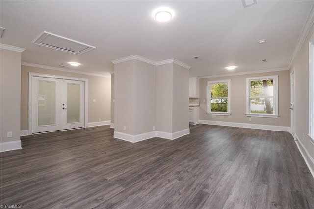 unfurnished living room featuring dark hardwood / wood-style floors, ornamental molding, and french doors