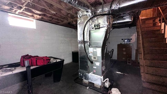 225 Dan Bryant Rd, Pilot Mountain, NC 27041 - basement featuring stairway and heating unit
