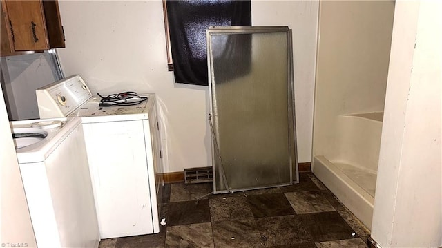 225 Dan Bryant Rd, Pilot Mountain, NC 27041 - washroom featuring washer / clothes dryer, stone finish floors, and baseboards