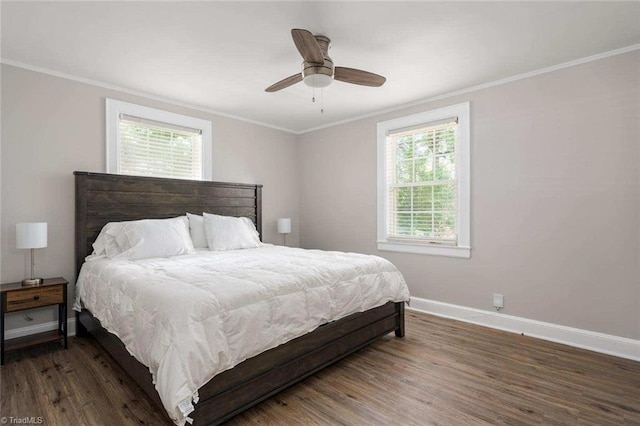 3006 Collier Dr, Greensboro, NC 27403 - bedroom with crown molding, wood finished floors, multiple windows, and ceiling fan