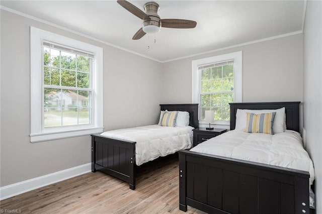 3006 Collier Dr, Greensboro, NC 27403 - bedroom with light wood-style floors, crown molding, and ceiling fan