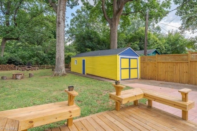 3006 Collier Dr, Greensboro, NC 27403 - view of yard with a shed, a wooden deck, and view of scattered trees